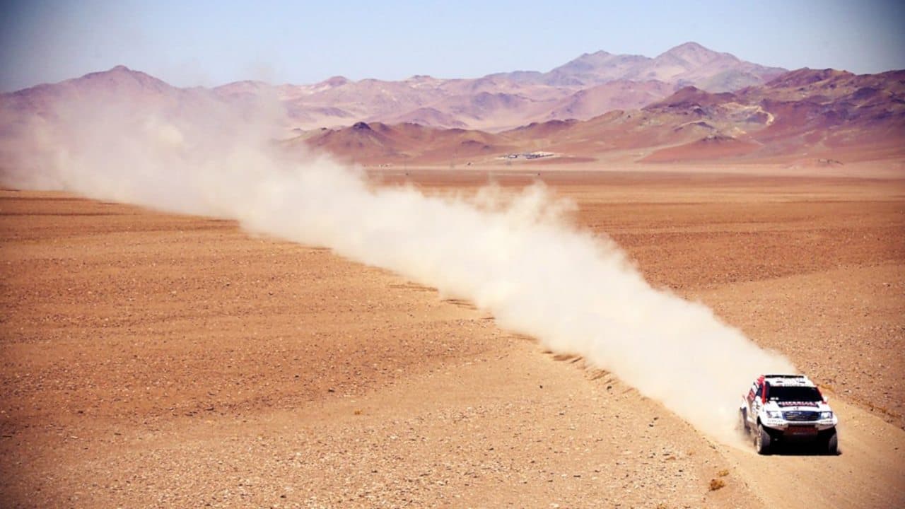 Madness in the Desert: The Paris to Dakar Story backdrop