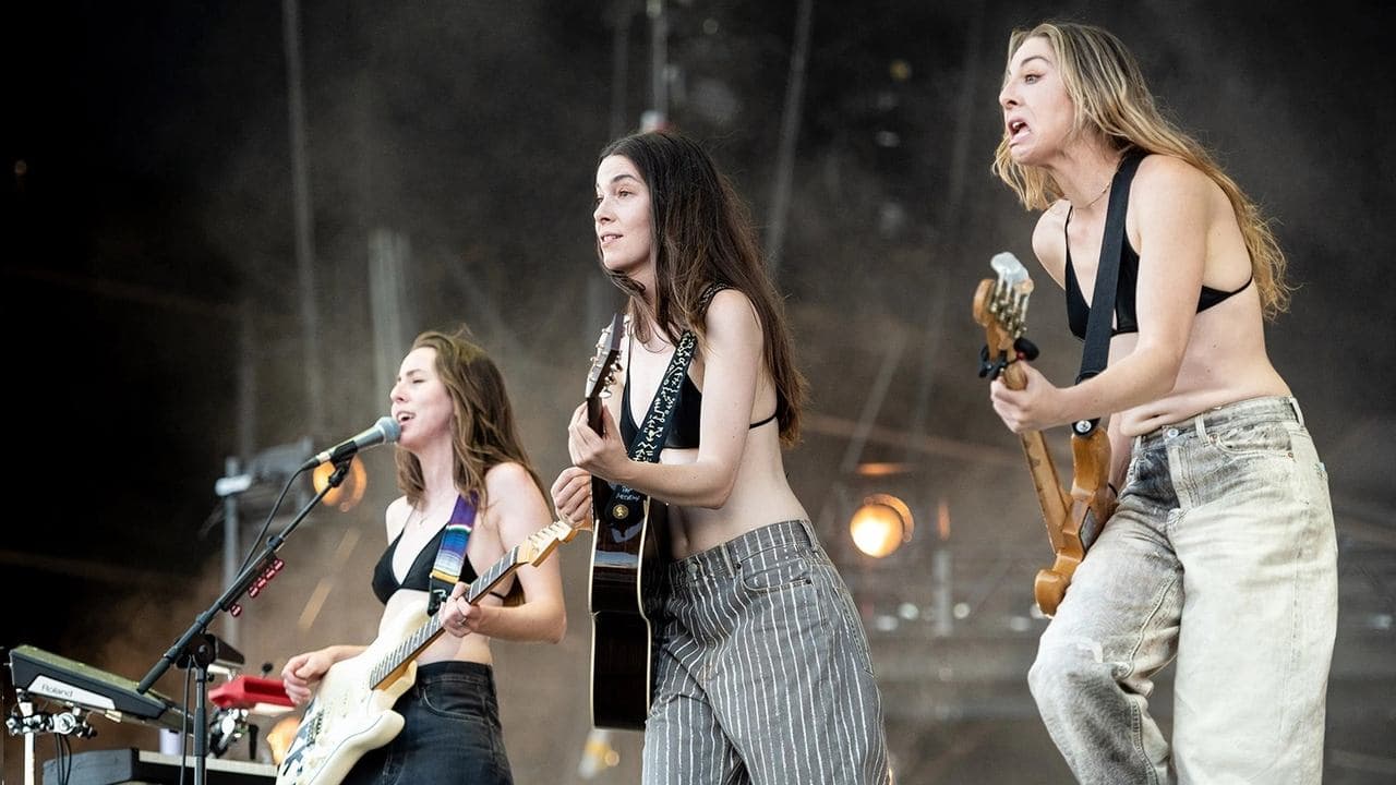 HAIM at Glastonbury 2021 backdrop